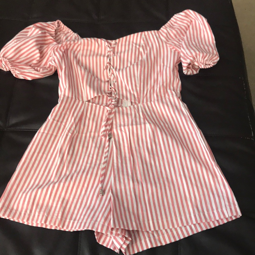 Main Strip romper never worn